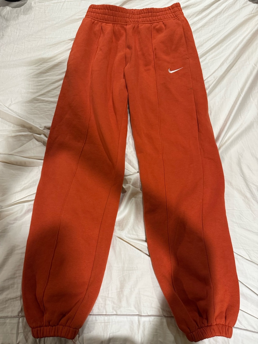 Nike Kids Orange-Red Fleece Joggers with White Swoosh